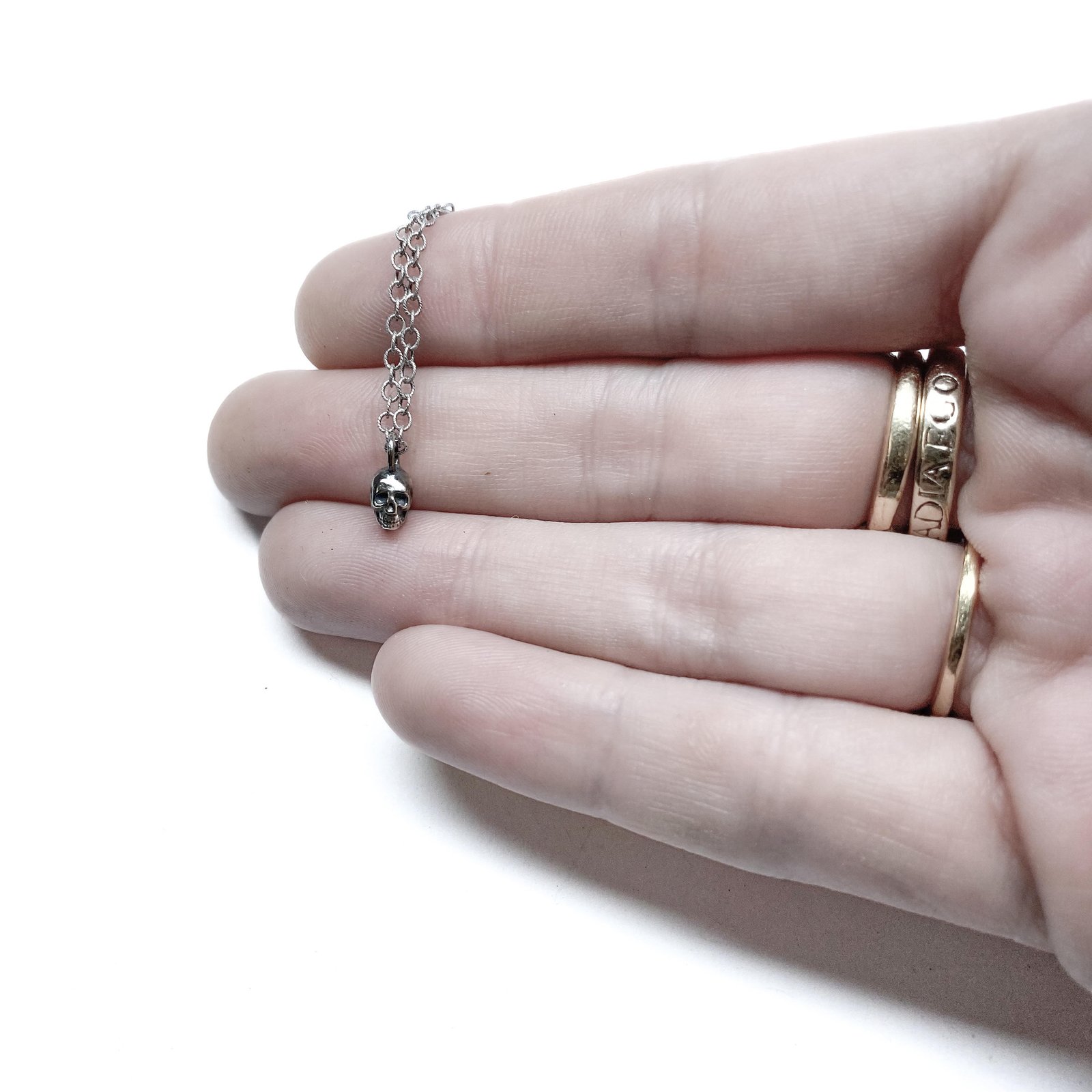 Tiny Skull pendant necklace in sterling silver or gold Tiny Skull pendant necklace in sterling silver or gold
